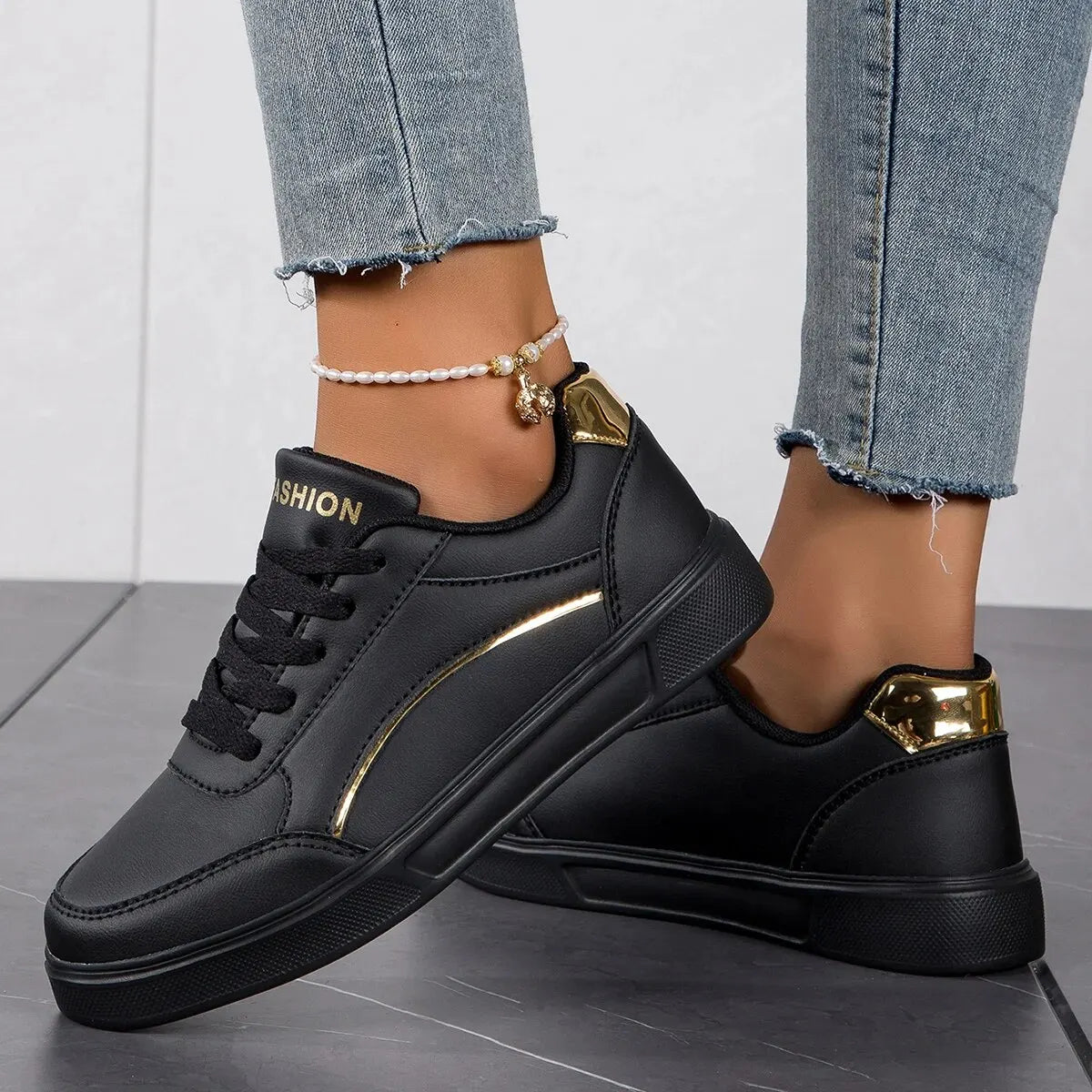 Women's black Sneakers assents gold